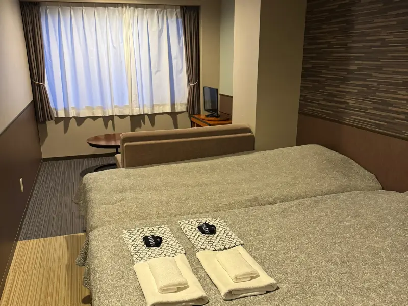 Guest room at Tominoko Hotel Kawaguchiko with window view